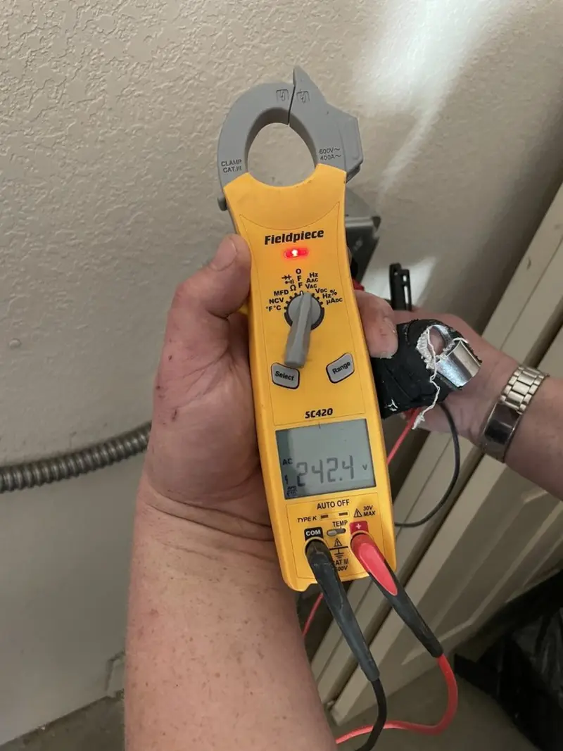 Voltage testing with clamp meter during Hot Tub / Pool Electrical Wiring in Cumberland